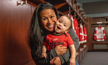 Maris posed with child in Red Wings gear