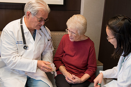 structural heart patient lillian keavey with her doctors