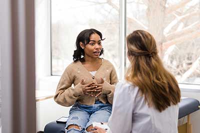 patient talking to doctor