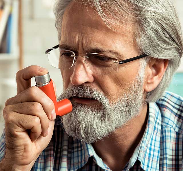 man using inhaler