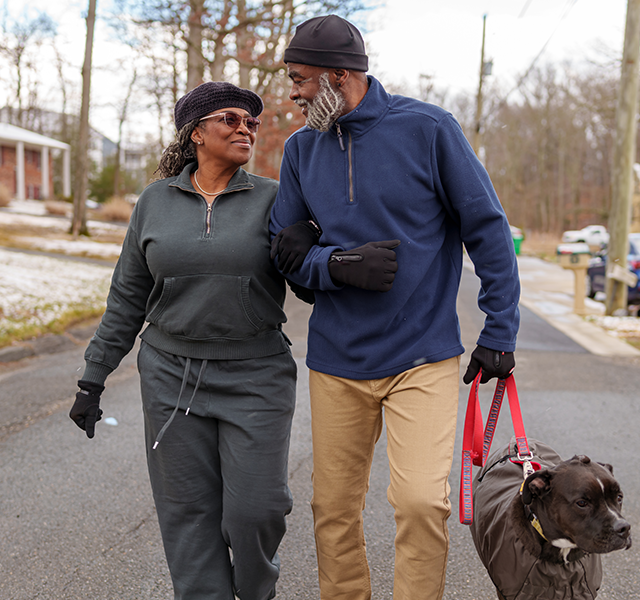 older couple walking outside