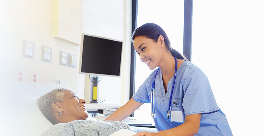 https://www.henryford.com/-/media/project/hfhs/henryford/hero-images/henry-ford/about/about-us/new-nurse-smiling-at-patient-in-hospital-rev.jpg?rev=995e7027ae534b75b1e73b2e03328804